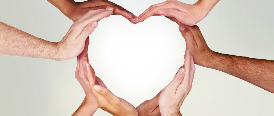 Multiracial Hands in a Heart Pattern