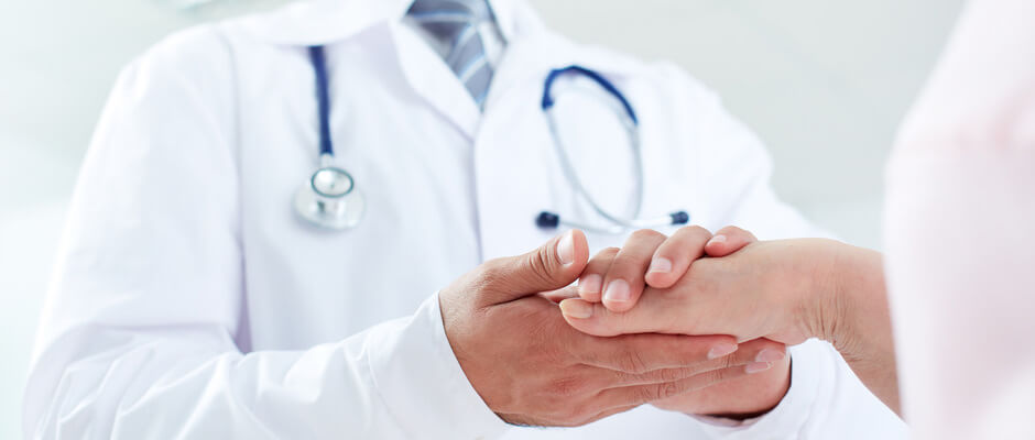 Doctor Holding Patient Hand